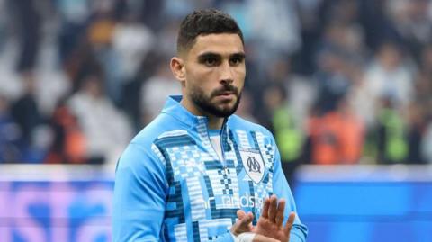 Neal Maupay applauds supporters before Marseille's game against PSG in November