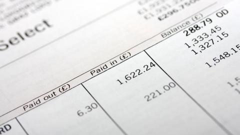 Close-up of a person's bank statement