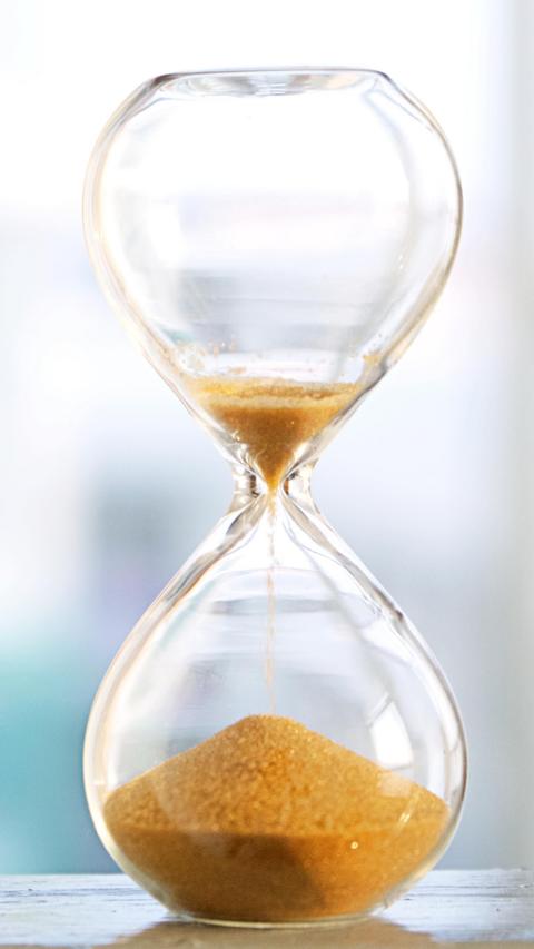 A glass sand timer 