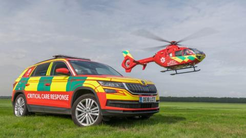 Image of a response vehicle and the Thames Valley Air Ambulance