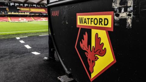 Watford crest on a dugout at Vicarage Road