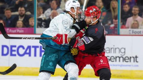 Hit on Cardiff Devils' Gleason Fournier at Belfast Giants