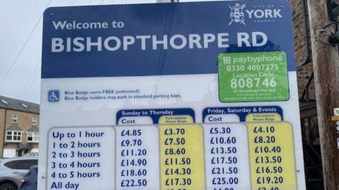 A image of a parking charge board in Bishopthorpe Road in York, which states the cost of parking per hour.