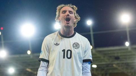 Nick Woltemade celebrates after scoring for Germany Under-21s against France at the Euros