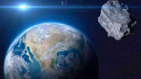 An artist's impression of planet Earth as seen from space with a piece of rock in the foreground