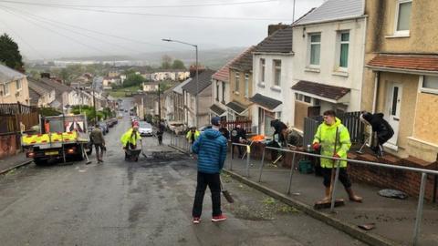 Swansea council and the community begin the clean-up