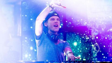 Avicii performing