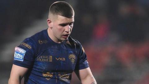 Finley Yates of Salford Red Devils looks dejected during the Super League match between St Helens and Salford Red Devils in February