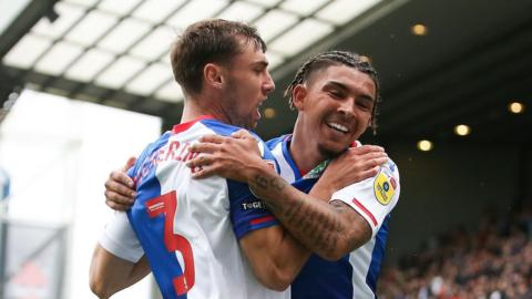 Blackburn's Tyrhys Dolan (R) celebrates his opener with Harry Pickering