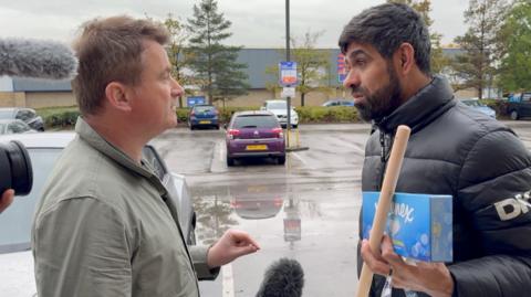 BBC reporter Ed Thomas confronting Shaxawan