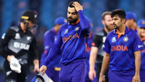 India captain Virat Kohli walks off looking dejected after an eight-wicket defeat against New Zealand at the Men's T20 World Cup