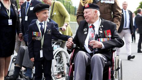D-Day veteran John Quinn meets six-year-old George Sayer