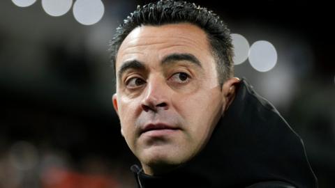 Barcelona manager Xavi looks round on the touchline
