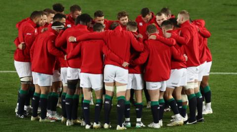 The Lions of  2025 huddle up 