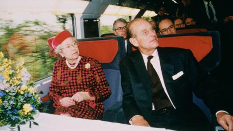 The Queen travelling on the Eurostar service with Prince Philip in May 1994