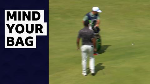 Aaron Rai and caddie