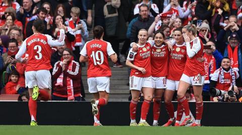 Arsenal players celebrate Olivia Smith's goal against Manchester City