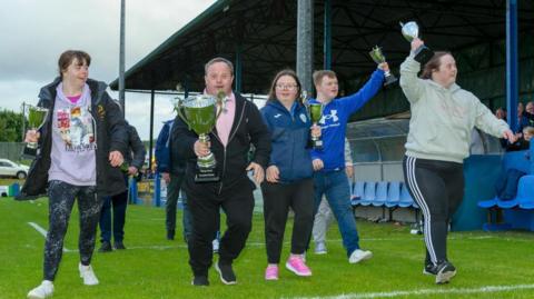 The Finn Harps Futsal team parading their trophy