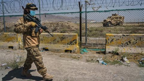 Taliban fighters guarding the perimeter of Kabul airport on 29 August