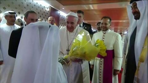 Pope given flowers upon arriving
