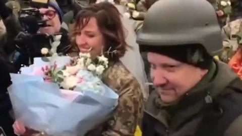 A Ukrainian couple get married on the front line