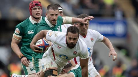 Ireland and England players in action during this year's Six Nations game