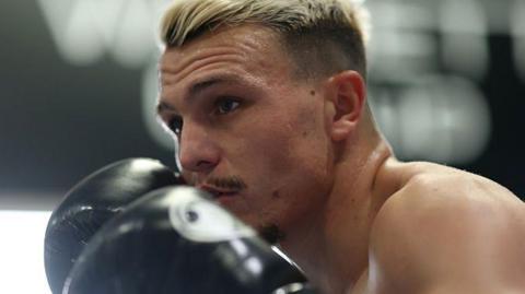A close-up of George Liddard during sparring.