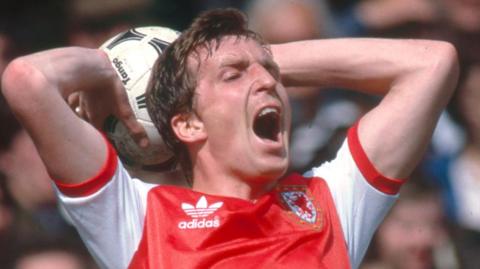 Joey Jones in action for Wales