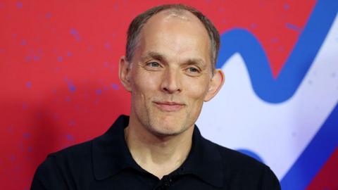 Thomas Tuchel smiles at a news conference discussing his England squad selection for the 2026 Fifa World Cup