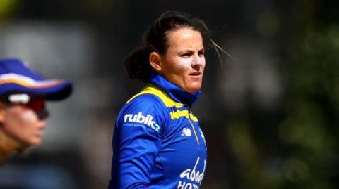 Erin Osborne looking on during a match in 2022