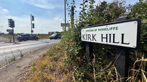 A sign at the Kirk Hill junction of the A6097