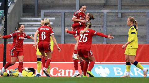 Mia Enderby of Liverpool celebrates goal with teammates during the Barclays Women's Super League match between Liverpool and Tottenham Hotspur.
