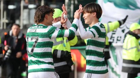 Jota and Kyogo Furuhashi celebrate with Celtic