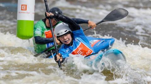Lois Leaver competing at the Canoe Slalom World Cup event in Prague in 2024