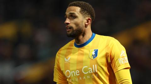 Jordan Bowery looks on during a game for Mansfield
