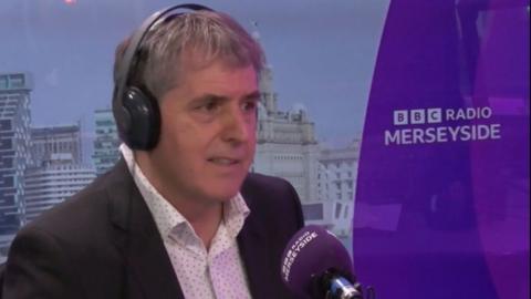 Steve Rotheram in a BBC Radio Merseyside studio