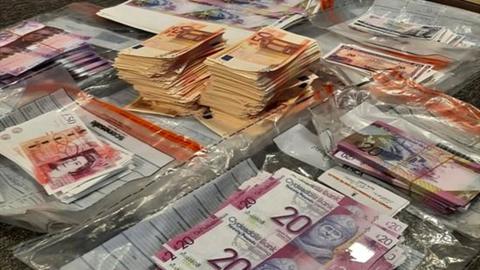 Piles of fake English and Scottish banknotes found by police