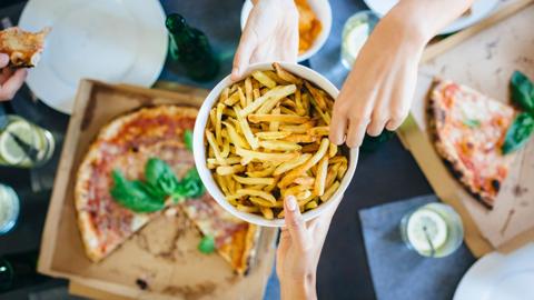 Stock image of pizza and chips