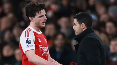 Declan Rice and Mikel Arteta