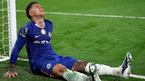 Enzo Fernandez looks to the sky in pain after a miss