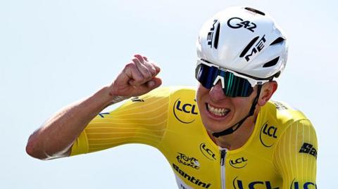Tadej Pogacar celebrates winning stage 13 of the 2025 Tour de France