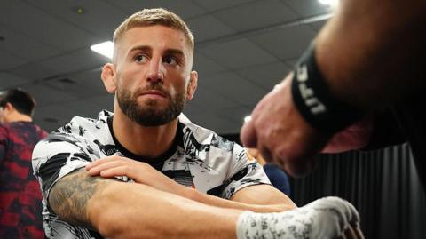 Oban Elliott gets his hands wrapped prior to UFC 325