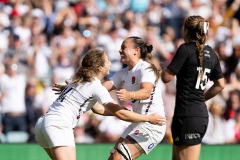 Abby Dow celebrates her try