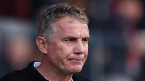 Phil Parkinson on the touchline 