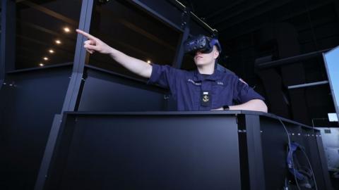 Sailors use simulator
