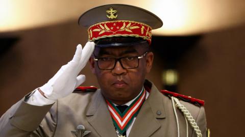 Military general Ruphin Fortunat Zafisambo gestures after being named Prime Minister by Madagascar's President Andry Rajoelina at the Lavoloha Presidential Palace