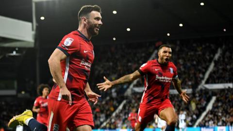 Scott Hogan and Troy Deeney celebrate