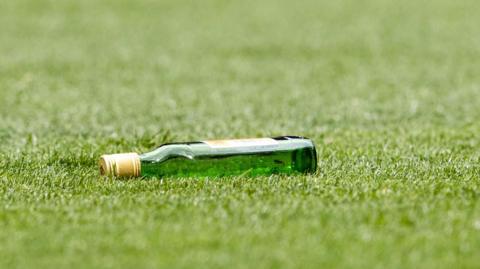 Bottle on the Ibrox pitch