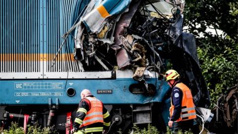 Rescue workers at the scene of a train crash near the German-Czech border