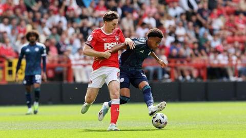 Louis Page of Leicester City in action with Conor Coventry of Charlton Athletic